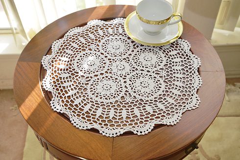 round crochet table top. 16" round. white color. 2 pieces